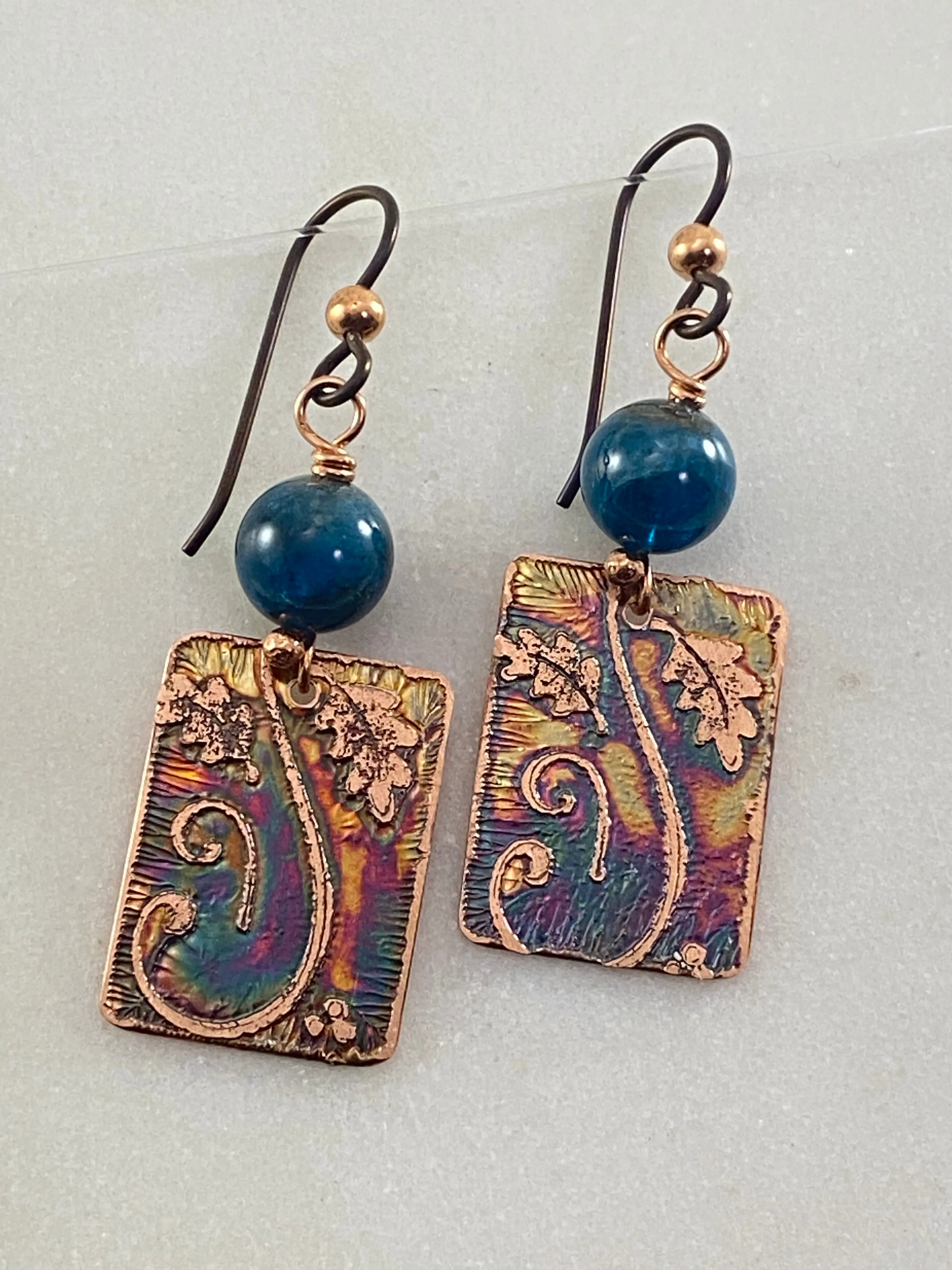 Acid etched copper earrings with apatite gemstones