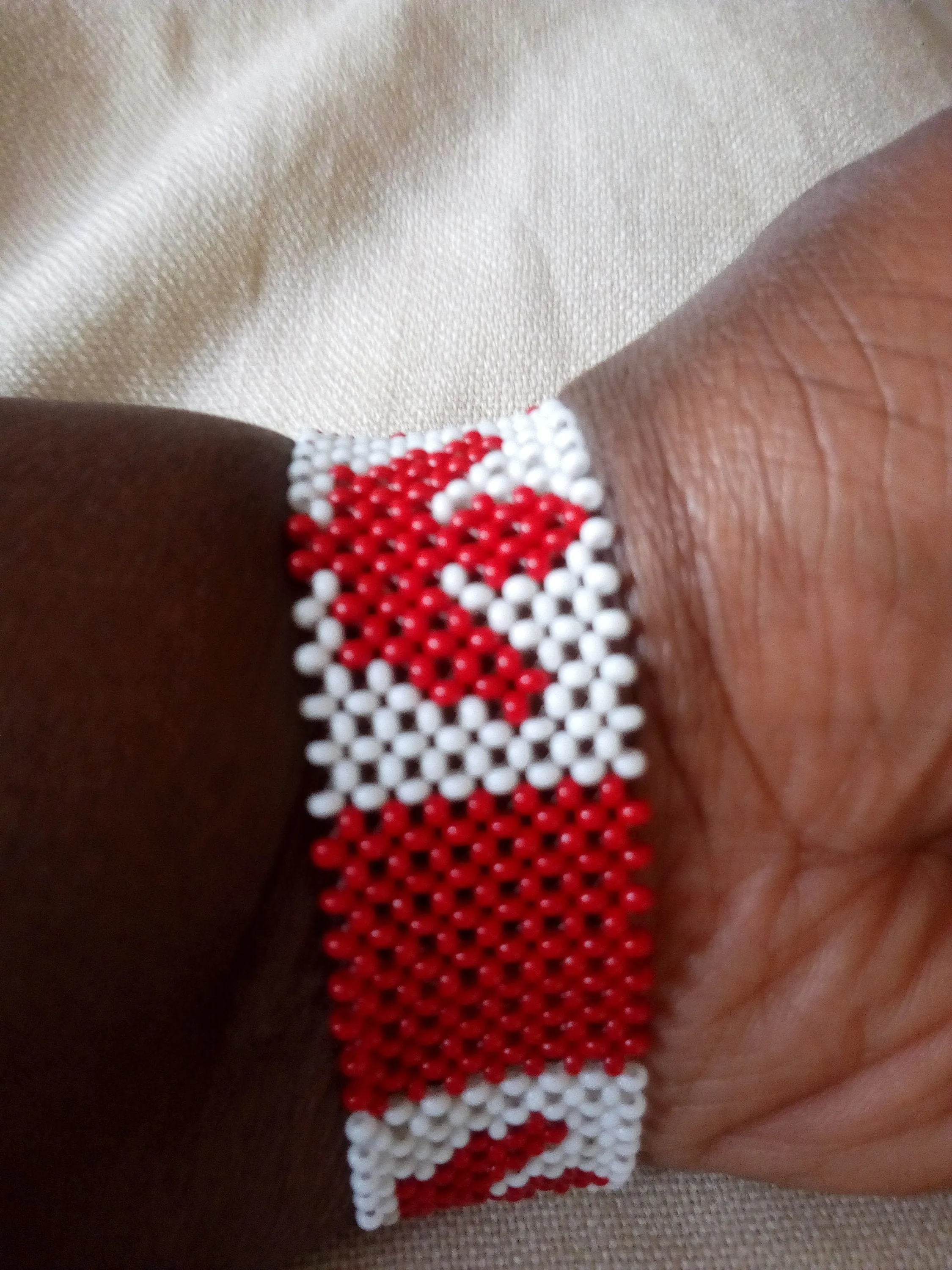 Beautiful Canadian flag bracelets made in Kenya by the masaai/masai/maasai community