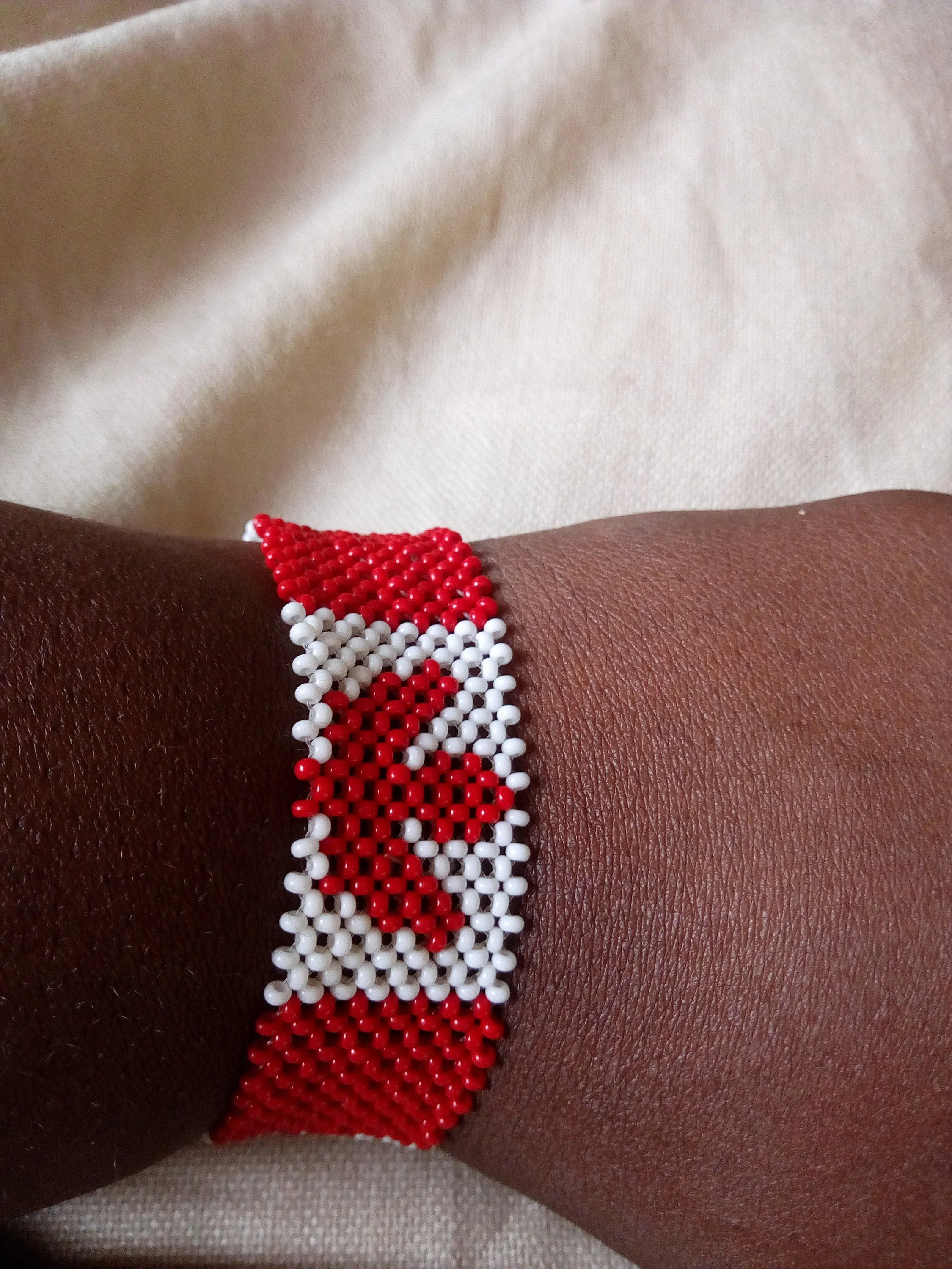 Beautiful Canadian flag bracelets made in Kenya by the masaai/masai/maasai community