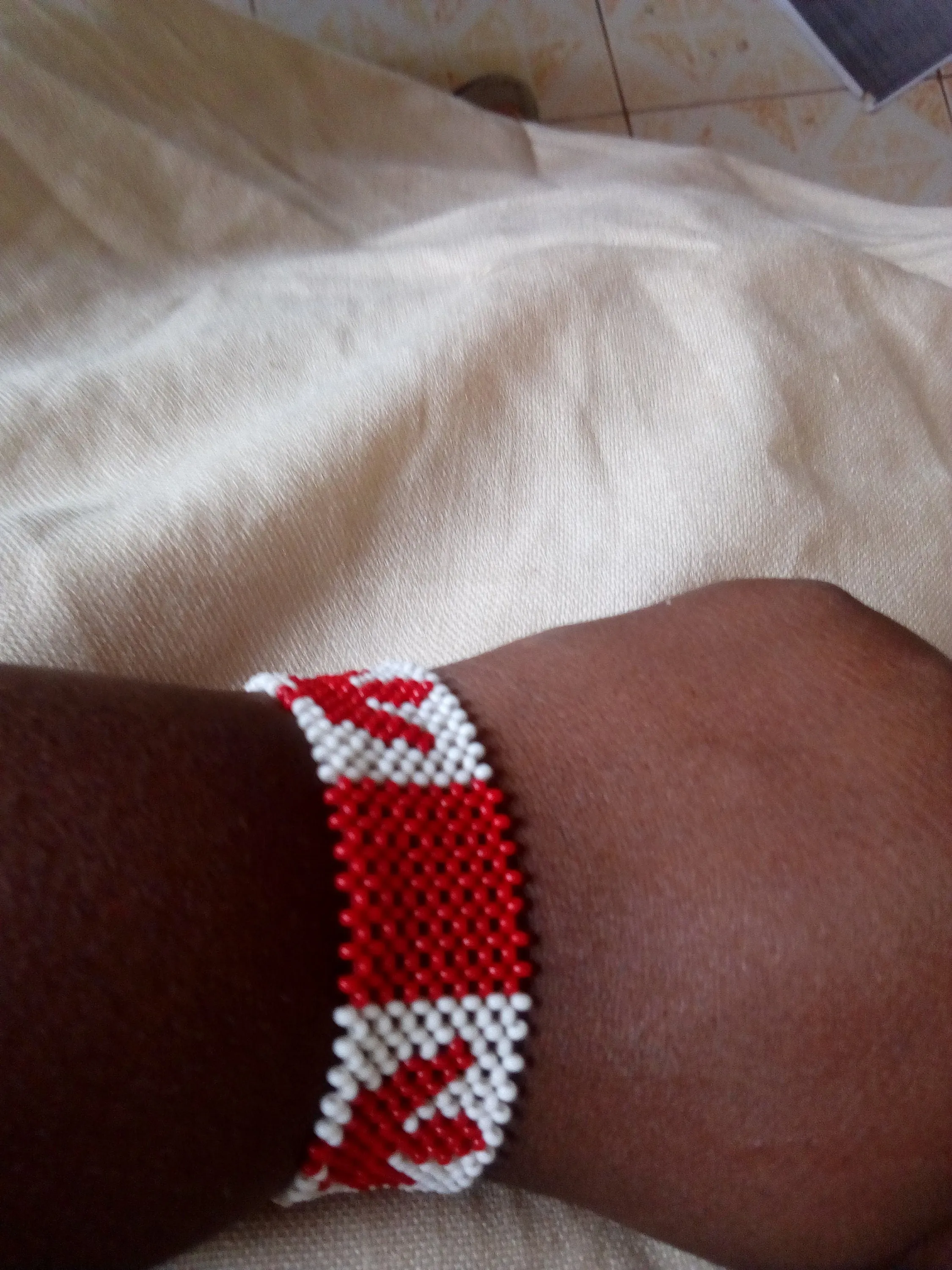 Beautiful Canadian flag bracelets made in Kenya by the masaai/masai/maasai community