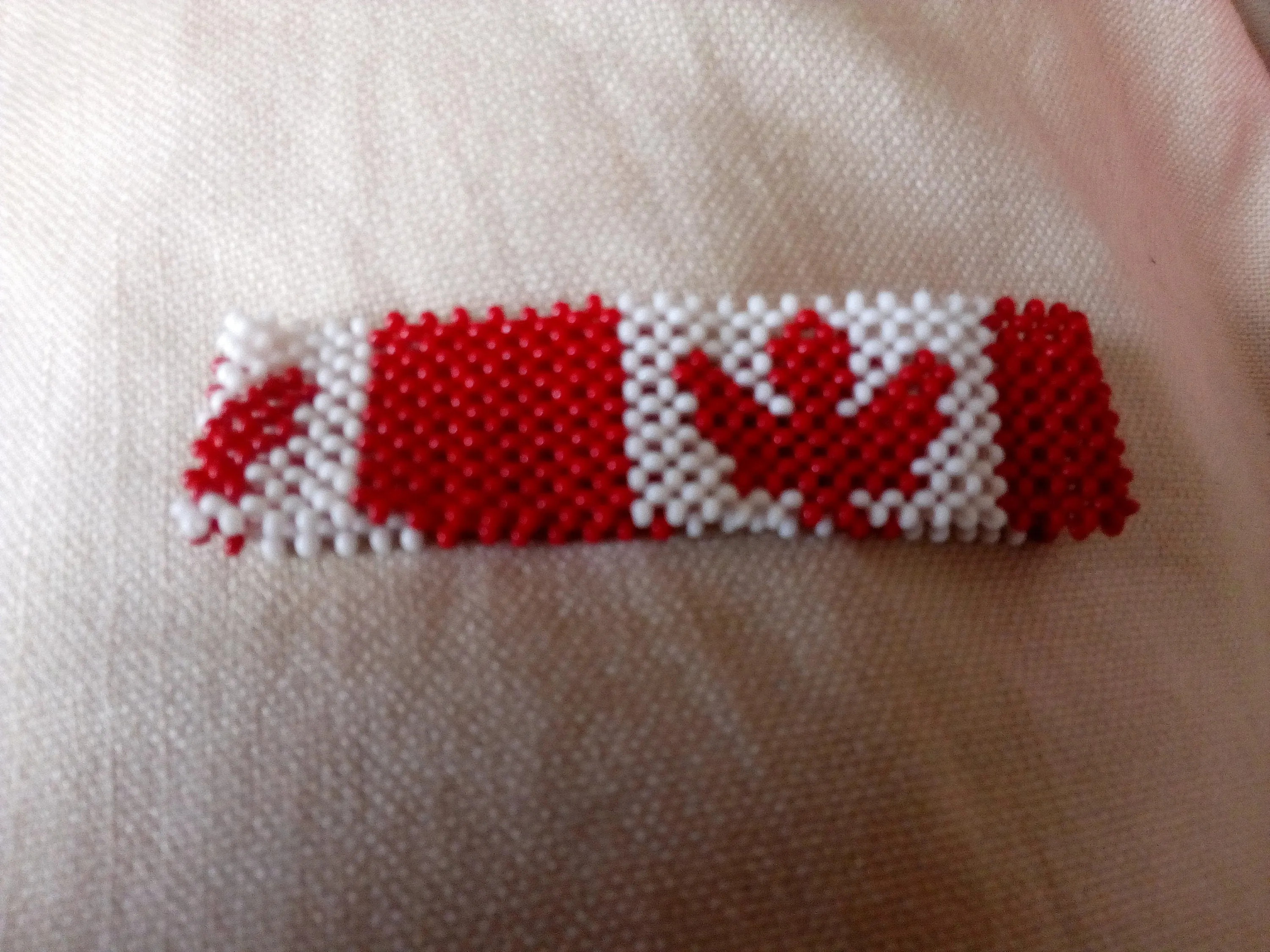 Beautiful Canadian flag bracelets made in Kenya by the masaai/masai/maasai community